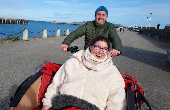 Woman on a wheelchair bike