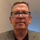 Mr. David Walsh Profile of man wearing glasses